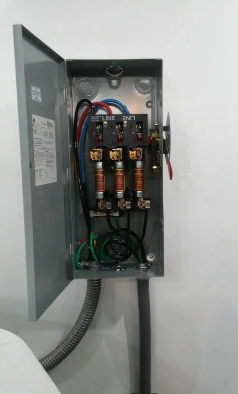 Three-phase disconnect switch installed for Smoke Detector Installation in Harrisville