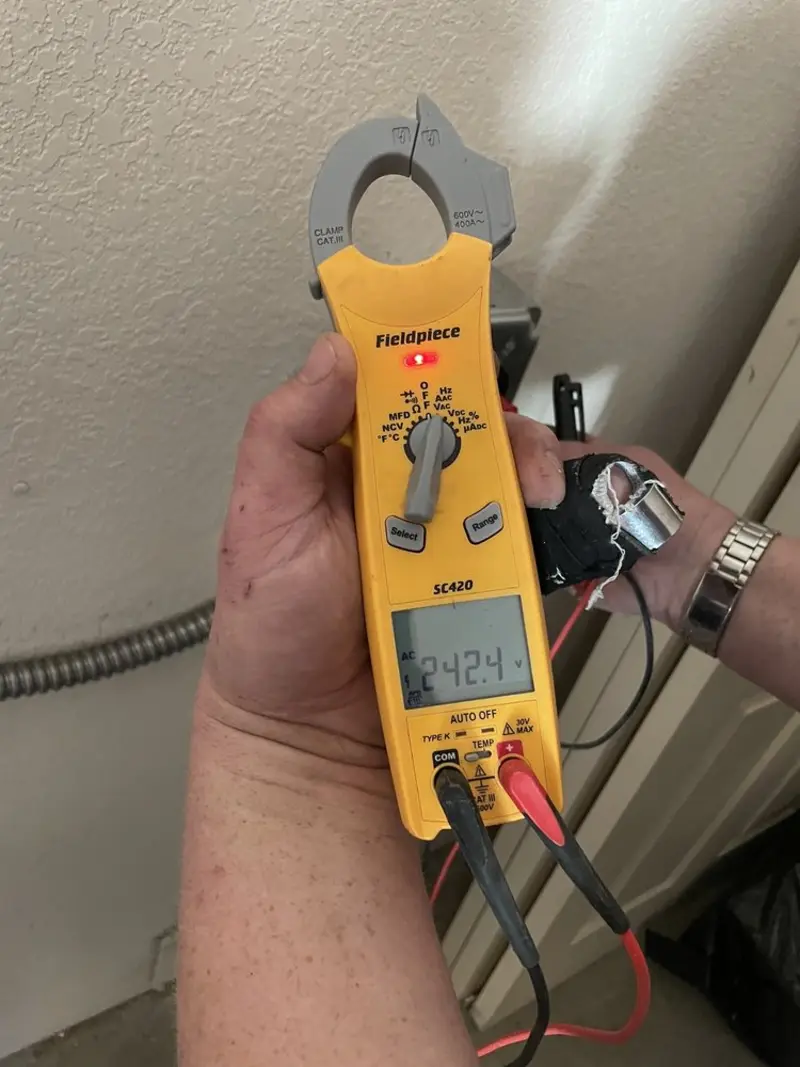 Voltage testing with clamp meter during Aluminum Wiring Replacement in Harrisville